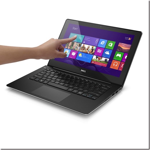 Dell Inspiron 11 3000 Series (Model 3137) notebook / laptop computer with hand interacting with touchscreen.